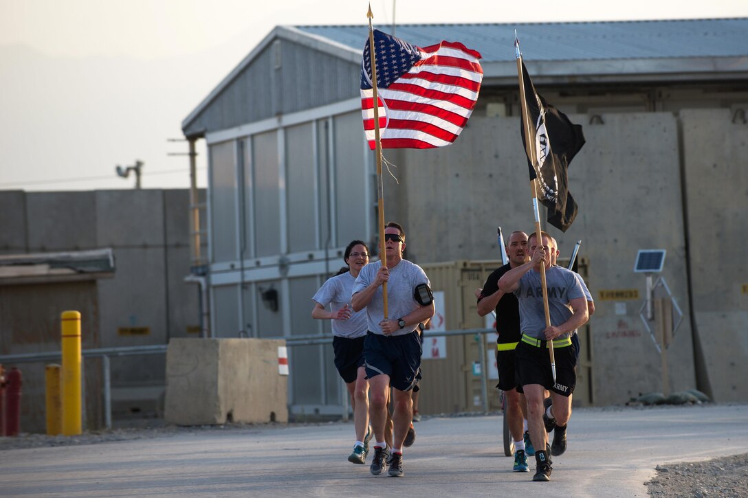 U.S. service members participate in a run to honor prisoners of war and those missing in action on Bagram Airfield, Afghanistan, Sept. 3, 2015. U.S. Air Force photo by Tech. Sgt. Joseph Swafford