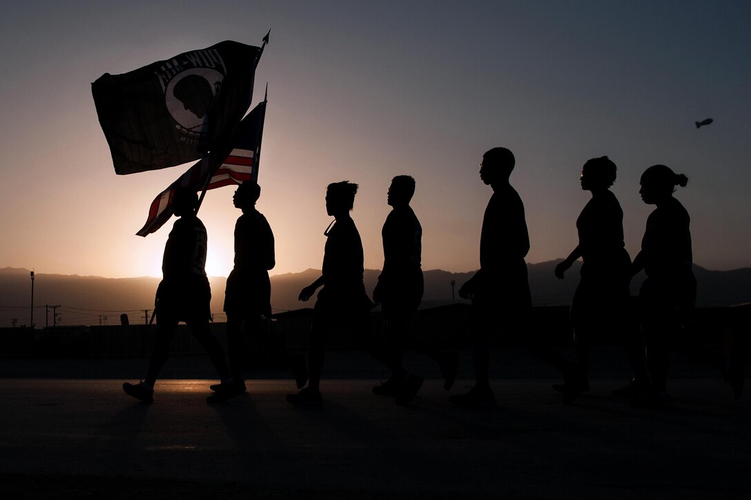 U.S. airmen participate in a run on Bagram Airfield, Afghanistan, to honor prisoners of war and those missing in action, Sept. 3, 2015. U.S. Air Force photo by Tech. Sgt. Joseph Swafford