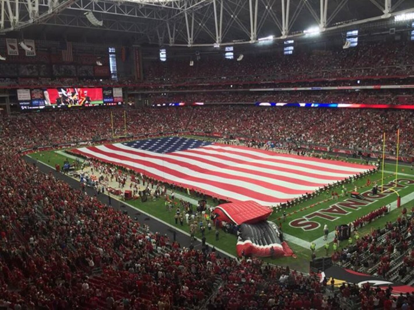 Marines with CLR 15 present the American flag at the Arizona Cardinals opening game, closing out Marine Week Phoenix in style.
