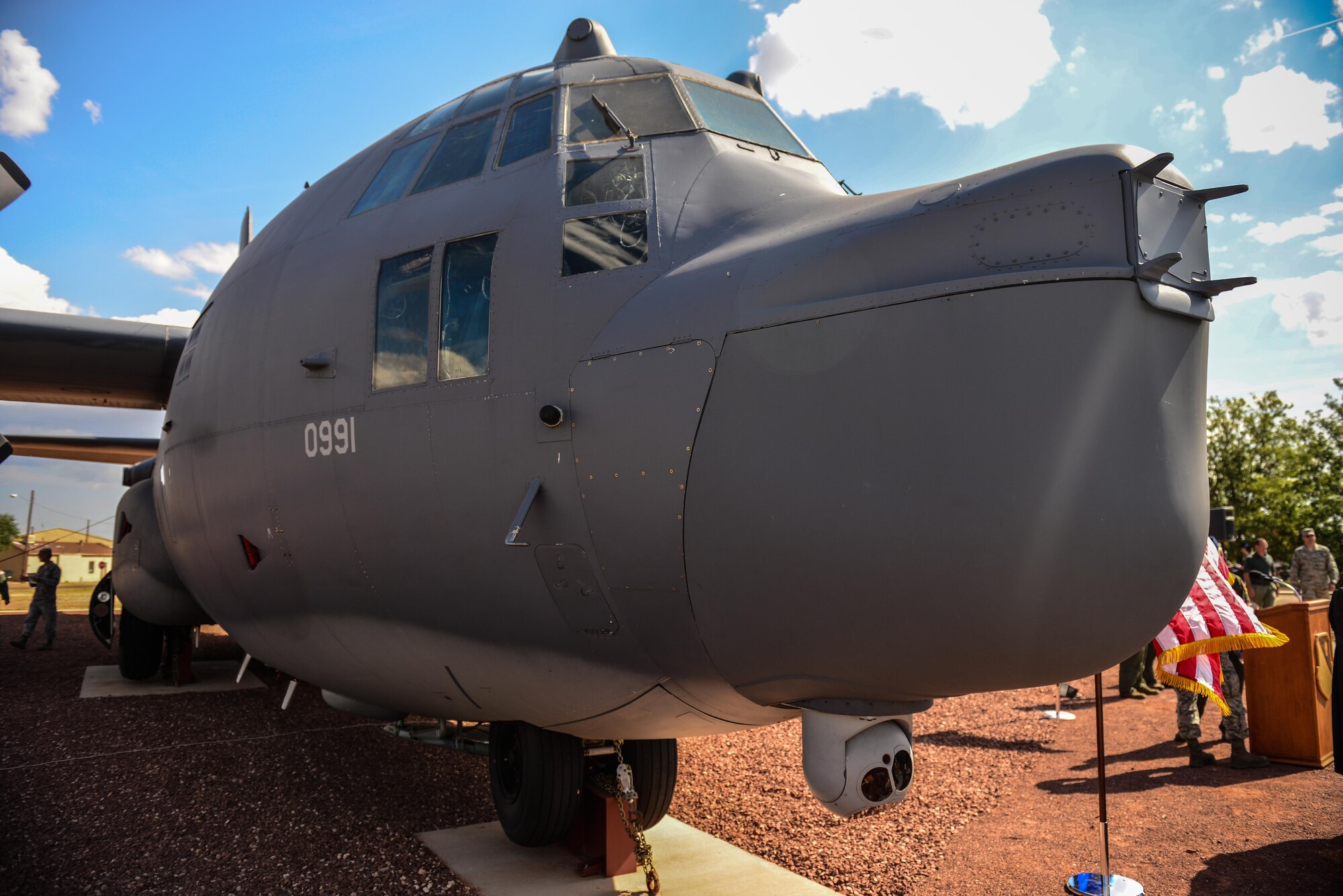 Lime 02, an MC-130P Combat Shadow that refueled assault helicopters during a Prisoner of War rescue attempt in Vietnam, stands sentry near the front gate Sept. 3, 2015 at Cannon Air Force Base, N.M. The Combat Shadow’s crucial role in the Son Tay Raid was celebrated during a ceremony reminding Air Commandos of their special operations heritage. (U.S. Air Force photo/Airman 1st Class Shelby Kay-Fantozzi)