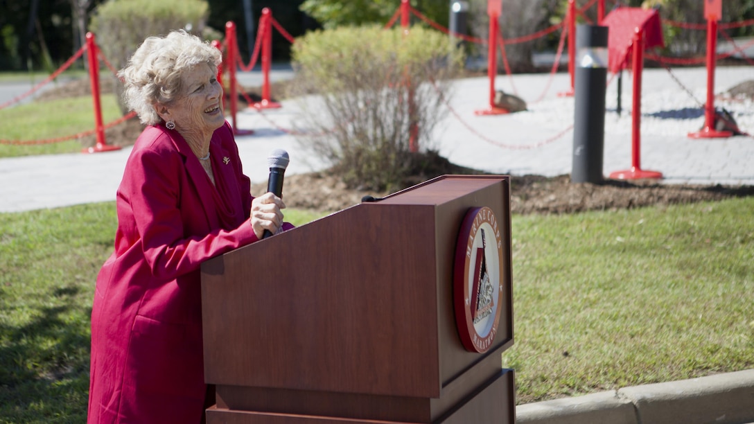 Betsy Fowler, widow of Col. James Fowler founder of the Marine Corps Marathon, speaks at the Marine Corps Marathon building dedication at Marine Corps Base Quantico, Virginia, Sept. 14, 2015. James Fowler founded the Marine Corps Marathon in 1975, while still serving at Headquarters Marine Corps, to help create a community of goodwill between the Marine Corps and the civilian populace. 