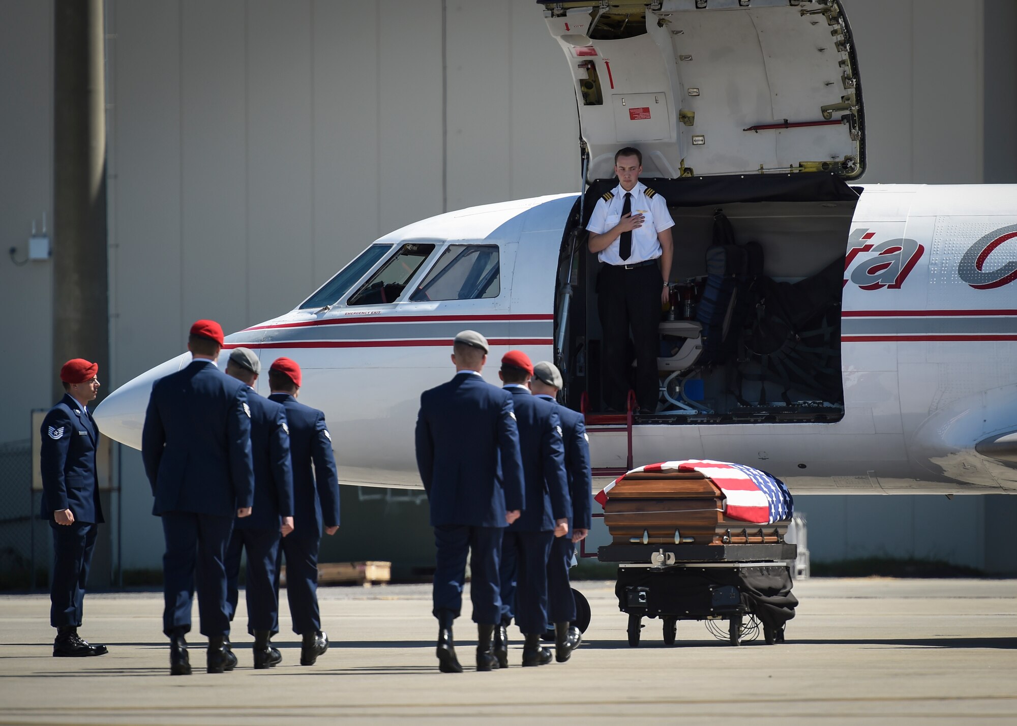 Special Tactics Airmen prepare to transfer the remains of Staff Sgt. Forrest B. Sibley on Hurlburt Field, Fla., Sept. 14, 2015. (U.S. Air Force photo by Airman Kai White/Released)