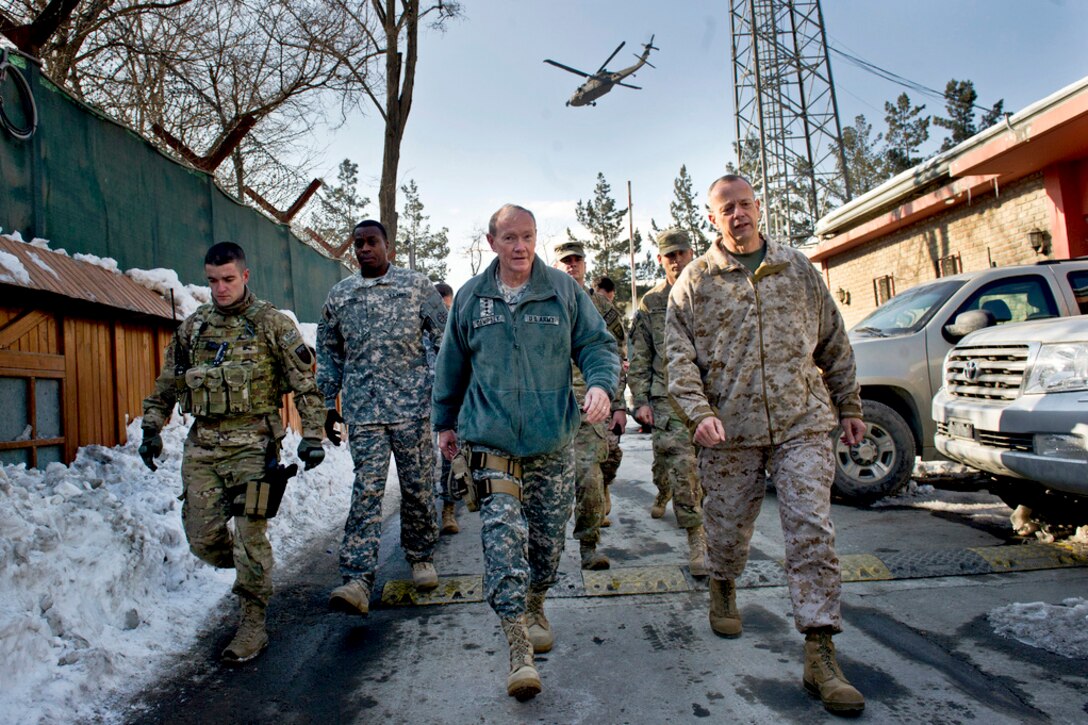 U.S. Army Gen. Martin E. Dempsey, chairman of the Joint Chiefs of Staff, and U.S. Marine Corps Gen. John R. Allen, commander of U.S. and international and forces in Afghanistan, talk as they walk to the force's headquarters in Kabul, Afghanistan, Feb. 9, 2012 DoD photo by D. Myles Cullen