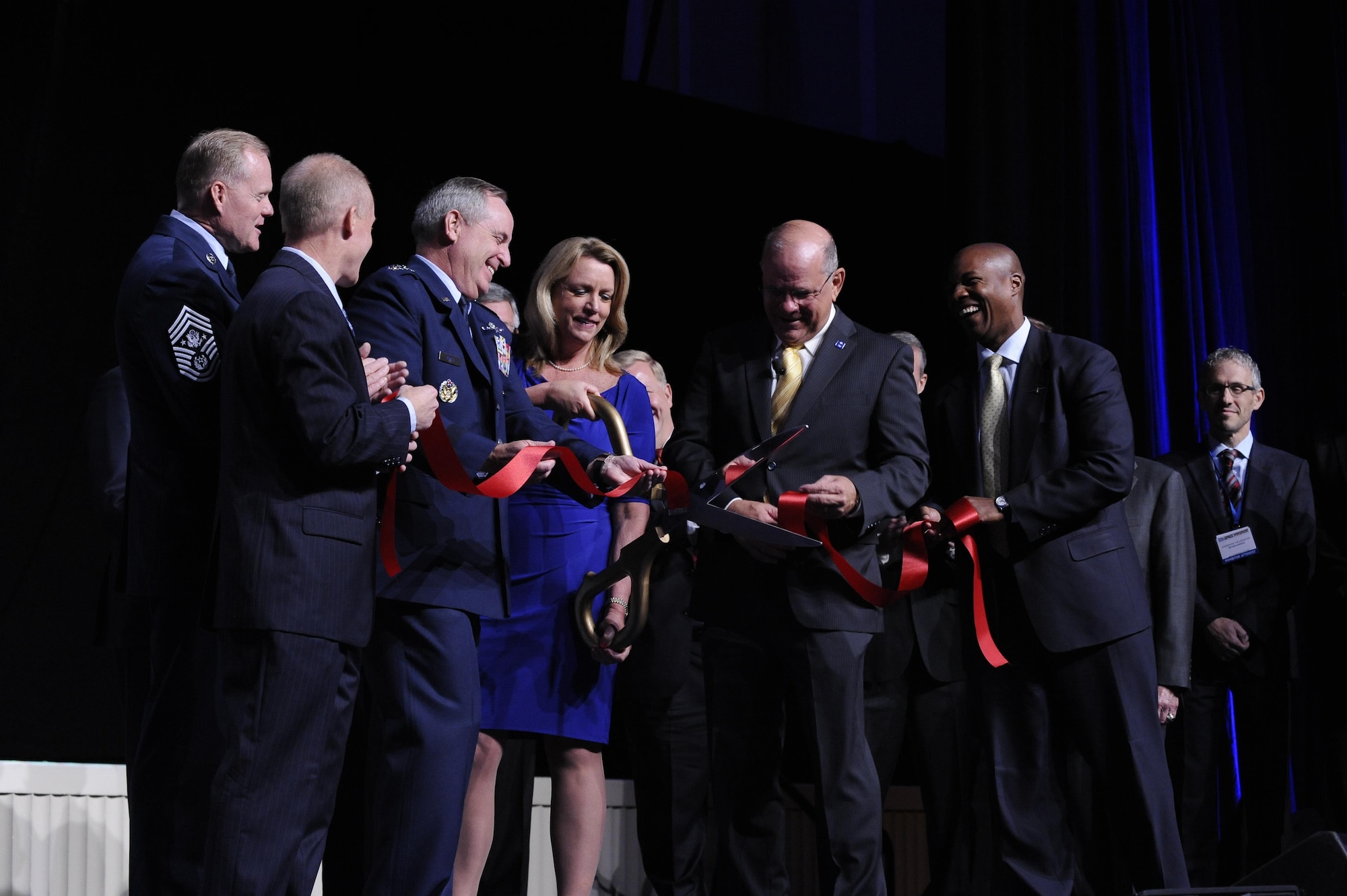 Senior Air Force leaders cut a ribbon during the Air Force Association's Air and Space Conference and Technology Exposition in Washington, D.C. on Sept. 14, 2015. The ribbon cutting ceremony kicked off of the conference and opening of the exhibit hall. (Air Force photo/Staff Sgt. Whitney Stanfield)