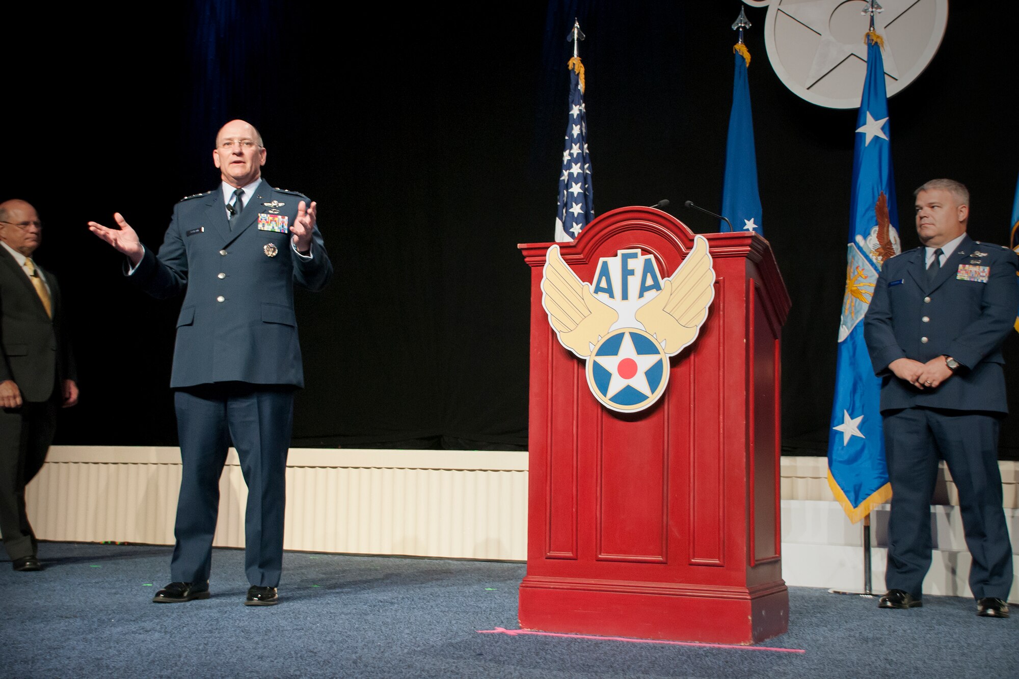 Lt. Gen. James "JJ" Jackson, commander of the Air Force Reserve Command, gives remarks during the unveiling ceremony of the painting “That Others May Live” during the Air Force Association Air and Space Conference and Technology Exposition, Washington D.C., Sept. 14, 2015. “That Others May Live” documents the rescue of Marcus Luttrell, a U.S. Navy SEAL, in June 2005 by reservists from the 920th Rescue Wing, Patrick Air Force Base, Fla. The well-known rescue was dramatized in the movie“The Lone Survivor.” (U.S. Air Force photo/Staff Sgt. Kat Justen)