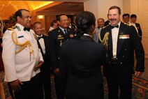 A Pacific Air Forces Airman greets Air Marshal Gavin Davies (right), Chief of the Royal Australian Air Force, and other international Air Chiefs at the 68th Annual Air Force Birthday Ball in Honolulu, Hawaii, Sept. 11, 2015. Davies and Air Chiefs from Bangladesh, Cambodia, Nepal, Japan, Mongolia and the Philippines attended the ball as special guests of PACAF Commander Gen. Lori J. Robinson before heading to Washington, D.C., for the Air Force Association Annual Air and Space Conference and Technology Exhibition. The Air Chiefs were in Hawaii as part of the Pacific Air Chiefs Symposium, which helped further the Air Force's partnership with the countries by showcasing PACAF's use of airpower in humanitarian assistance and disaster relief operations and providing a forum for the Air Chiefs to discuss training standardization and improve interoperability. (U.S. Air Force photo by Master Sgt. Matthew McGovern)