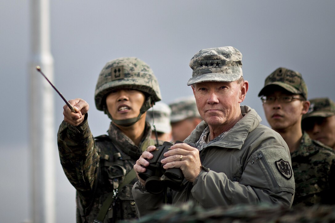 A South Korean soldier briefs U.S. Army Gen. Martin E. Dempsey, chairman of the Joint Chiefs of Staff, on points of interest at the Demilitarized Zone in South Korea, Nov. 11, 2012. DOD photo by U.S. Navy Petty Officer 1st Class Chad J. McNeeley