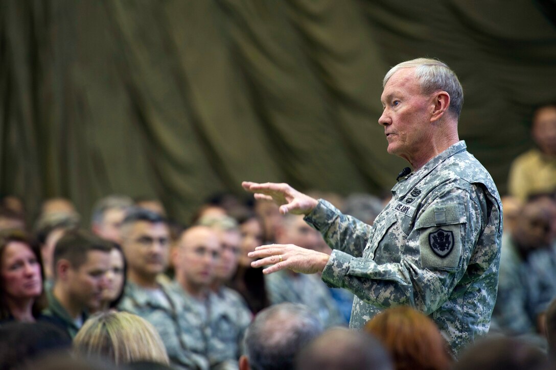 U.S. Army Gen. Martin E. Dempsey, chairman of the Joint Chiefs of Staff, speaks with U.S. service members on Yokota Air Base, Japan, April 25, 2013. Dempsey addressed a variety of issues, including sequestration, regional security and readiness. U.S. Air Force photo by Staff Sgt. Chad C. Strohmeyer