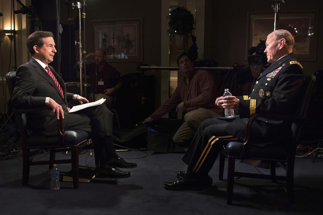 Army Gen. Martin E. Dempsey, right, chairman of the Joint Chiefs of Staff, speaks with Fox News Sunday host Chris Wallace during a recorded interview at the Pentagon, Jan. 9, 2015. Dempsey answered questions on a variety of topics, including the recent terrorist attack in Paris, ongoing operations against the Islamic State of Iraq and the Levant, or ISIL, and the mission in Afghanistan. DoD photo by D. Myles Cullen