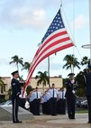 Airmen from Joint Base Pearl Harbor-Hickam’s Air Force Sergeant’s Association salute during a POW/MIA reveille ceremony, on JBPHH, Hawaii, Sept. 14, 2015. The ceremony begins this year’s POW/MIA week, which honors the 1,627 missing or unaccounted for military members  in all branches of armed  services. Some of the week’s events will include name readings of those missing or unaccounted for, a remembrance run and a honors and heritage ceremony, held at the Pearl Harbor visitor’s center.  (U.S. Air Force photo by Tech. Sgt. Aaron Oelrich/Released)