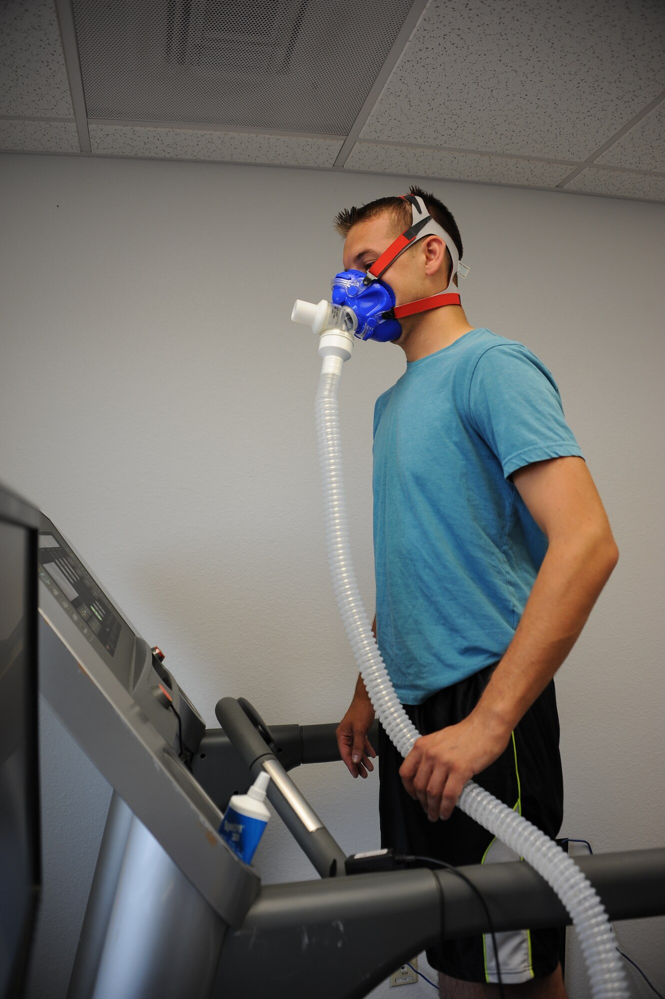 U.S. Air Force Senior Airman Yevgeniy Sokolov, 355th Aircraft Maintenance Squadron crew chief, stands on a treadmill in preparation to start a VO2 max test at the Health and Wellness Center at Davis-Monthan Air Force Base, Ariz., Sept. 2, 2015. The VO2 max measures the maximum amount of oxygen the body is able to use during a period of intense exercise depending on the subject’s weight and the strength of their lungs. (U.S. Air Force photo by Airman 1st Class Ashley N. Steffen/Released)