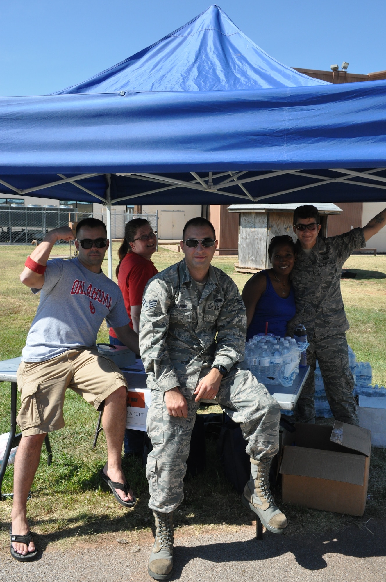 507th Air Refueling Wing members pose for a photo Sept. 12, 2015, at the 507th ARW Family Day celebration at Tinker Air Force Base, Okla. Each year, Reservists and their families are invited to the base for food, fun, and entertainment. (U.S. Air Force photo by Tech. Sgt. Lauren Gleason)