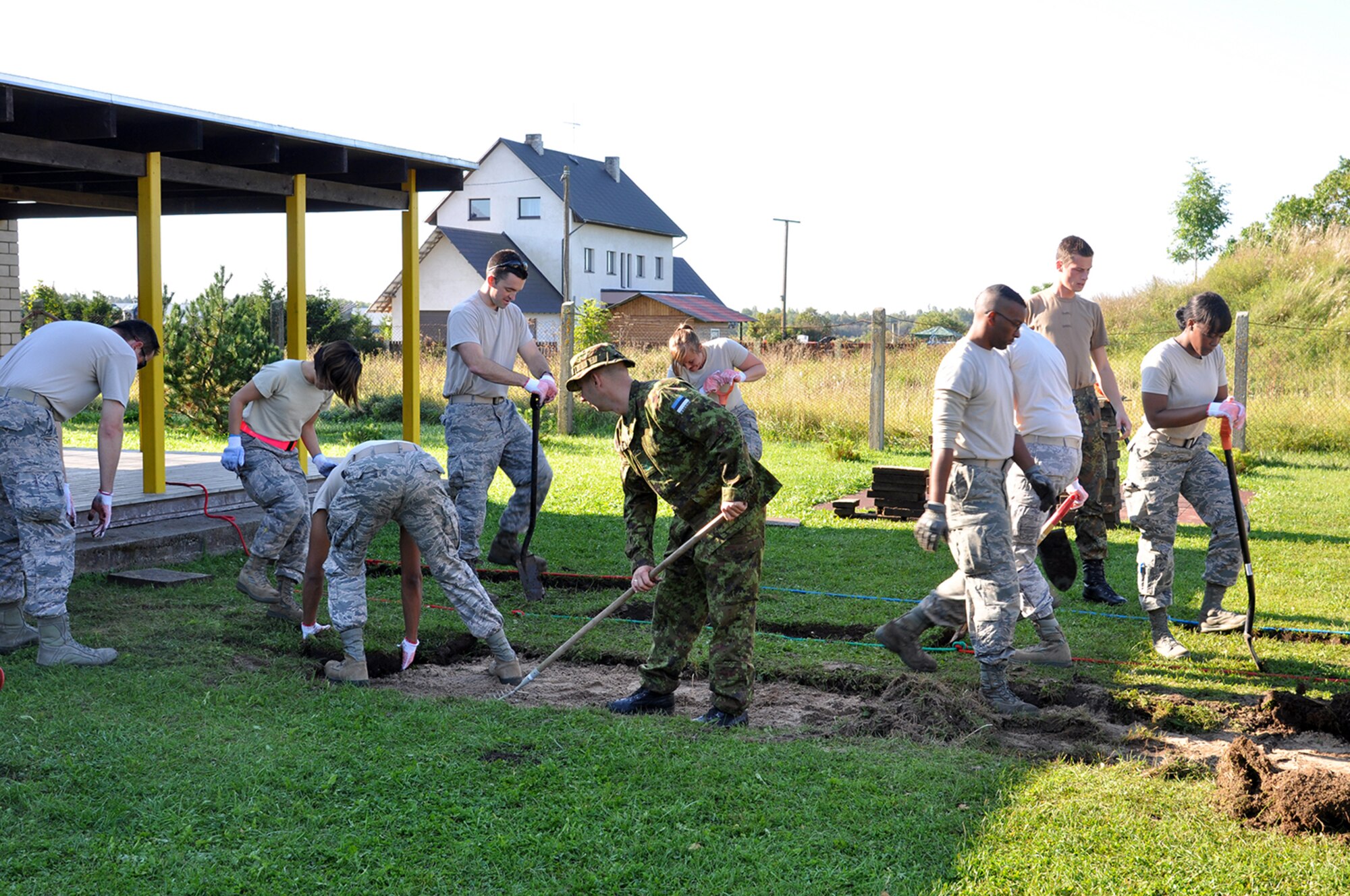 Reservists from the 442d Fighter Wing work with the Estonian and German military to construct a long jump at an elementary school outside of Amari Air Base in Estonia Sept. 12. The Airmen are here supporting Operation Atlantic Resolve (U.S. Air Force photo by Capt. Denise Haeussler)