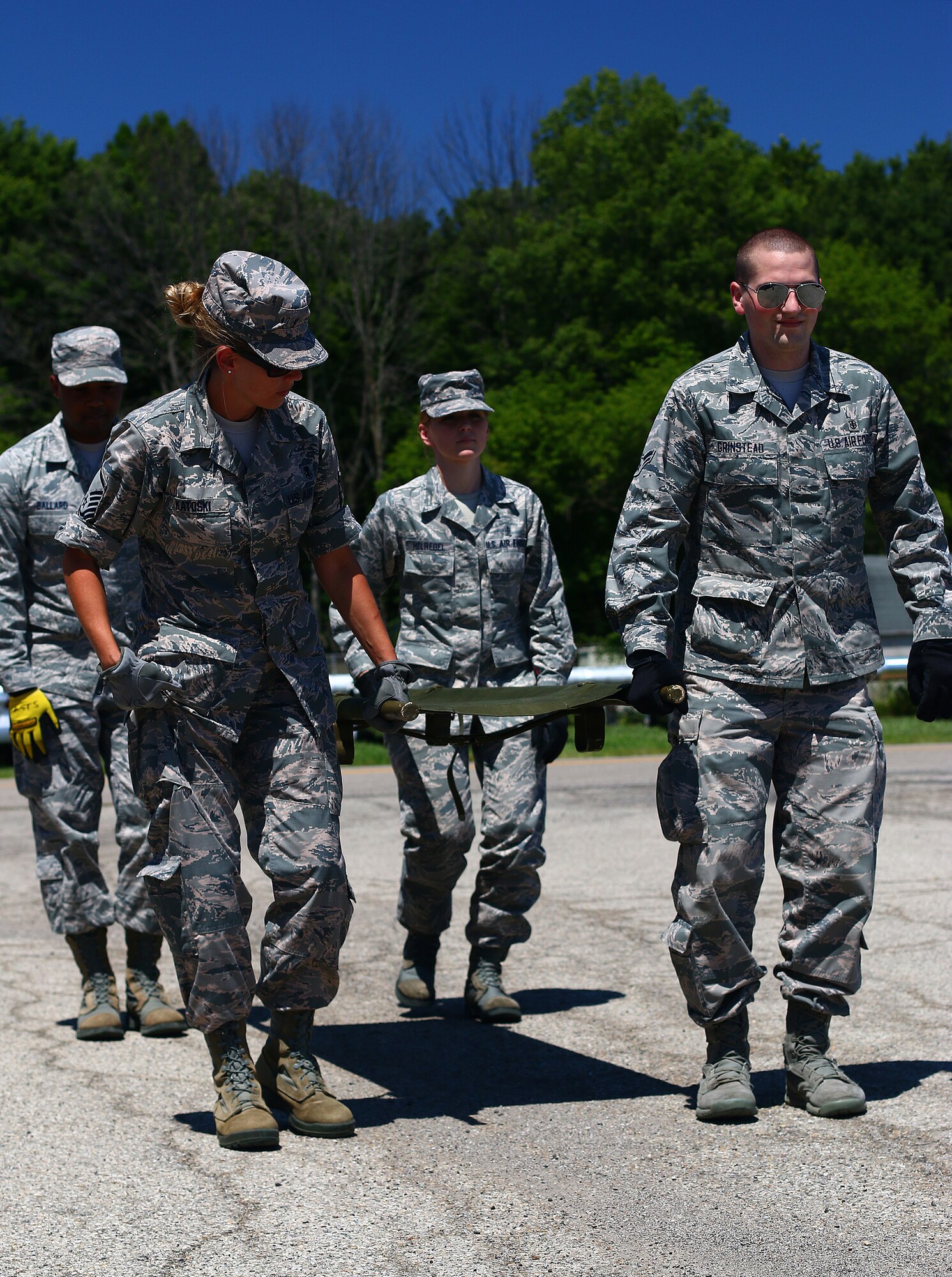 WRIGHT-PATTERSON AIR FORCE BASE, Ohio – Members of the 445th Aeromedical Staging Squadron run through litter carrying maneuvers during a training exercise outside the ASTS facility. The use of proper commands, lifting techniques, as well as safety procedures were imperative for the success of transporting patients to aircraft or ground vehicles.  Aug. 2, 2015. (U.S. Air Force photo /Tech. Sgt. Patrick O’Reilly)