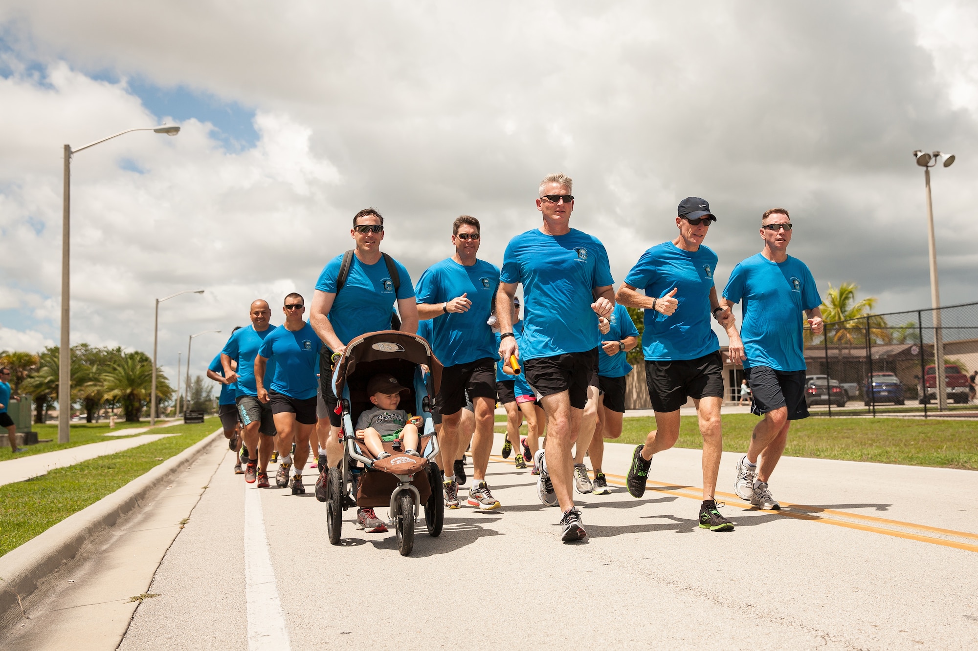 To commemorate the anniversary of the tragic events of 9/11, more than 80 service and family members of Special Operations Command South run to complete the last portion of a 140-mile relay run Sept. 11, 2015, during SOCSOUTH's annual 9/11 Memorial Run in Homestead Air Reserve Base, Fla. The run began the day before at the Southernmost Point Buoy attraction in Key West and concluded at the unit's headquarters at Homestead Air Reserve Base, Fla.. (U.S. Army photo by Staff Sgt. Osvaldo Equite/Released)