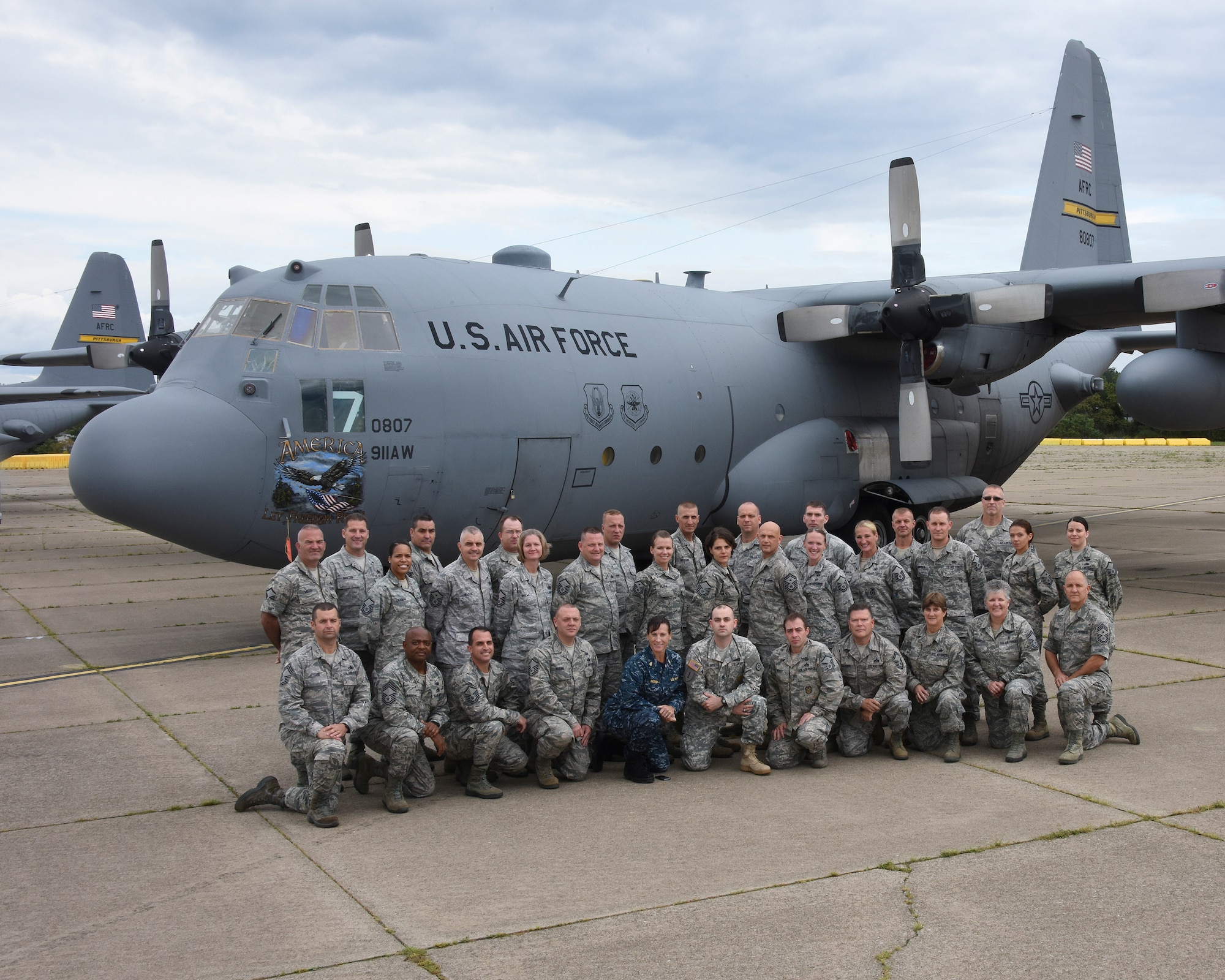 The 30 students who attended a Senior NCO Leadership Course hosted by the 911th Airlift Wing pose for a photo in front of a C-130 with their facilitators and Chief Master Sgt. Brian L. Zator, 911 AW command chief, Sept. 13, at the Pittsburgh International Airport Air Reserve Station, Pa. The SNCOLC was the first course of its kind to be hosted by the 911 AW since 2008, and graduated 26 personnel assigned to the 911 AW, a member from the 316 Expeditionary Sustainment Command, Navy Operational Support Center Pittsburgh, 171st Air Refueling Wing and an Air Force Reserve Command recruiter. (U.S. Air Force photo by Staff Sgt. Joshua J. Seybert)