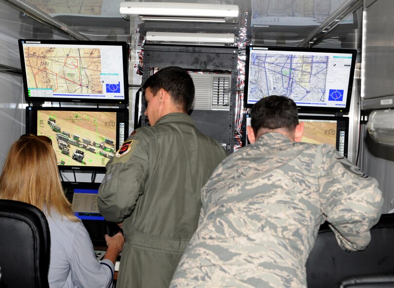 Airmen from the 184th Attack Squadron brief members of U.S. Senator John Boozman’s staff on the predator reaper integrated mission equipment trainer at Ebbing Air National Guard Base, Ark., Sept. 3, 2015. After the briefing, the congressional delegates were able to test their skills on the PRIME trainer. The visits to the 188th also included an updated mission brief and tour the new facilities. (U.S. Air National Guard photo by Staff Sgt. Hannah Dickerson/Released)