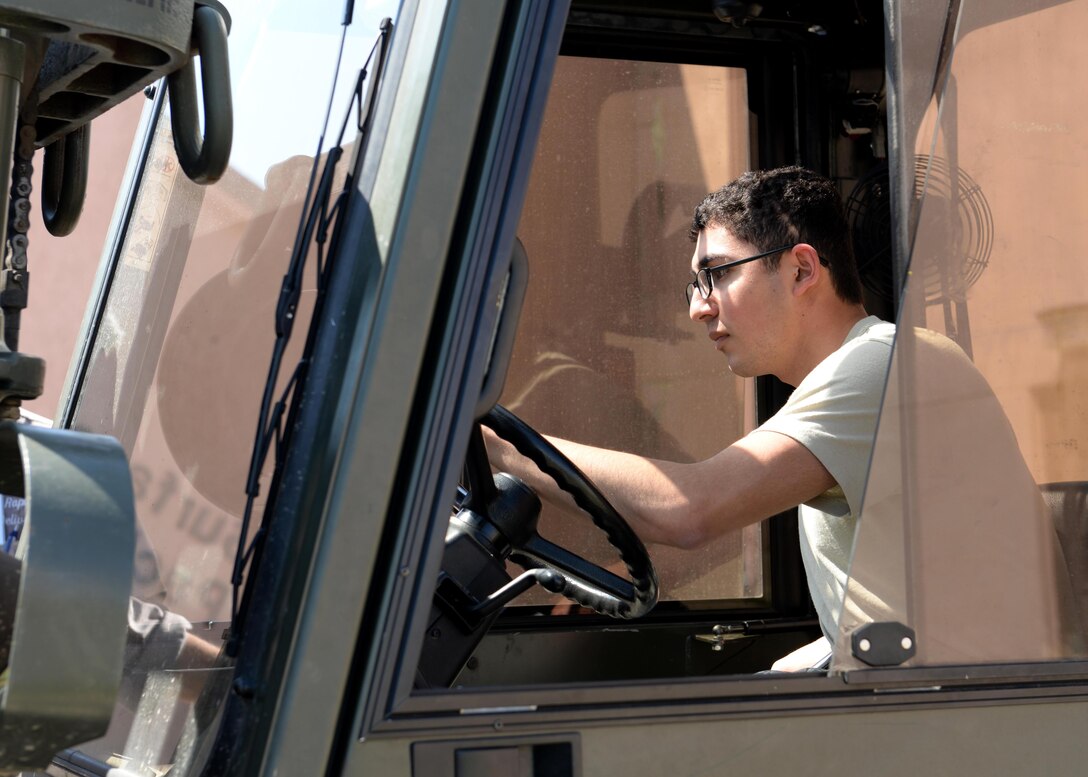 Airman 1st Class Barney Lopez, 28th Logistics Readiness Squadron receiving technician, operates a forklift at Ellsworth Air Force Base, S.D., Sept. 1, 2015. Each day, the receiving office sorts and delivers multiple shipments to different shops on base as well as to the wing supply system.   (U.S. Air Force photo by Senior Airman Rebecca Imwalle/Released)