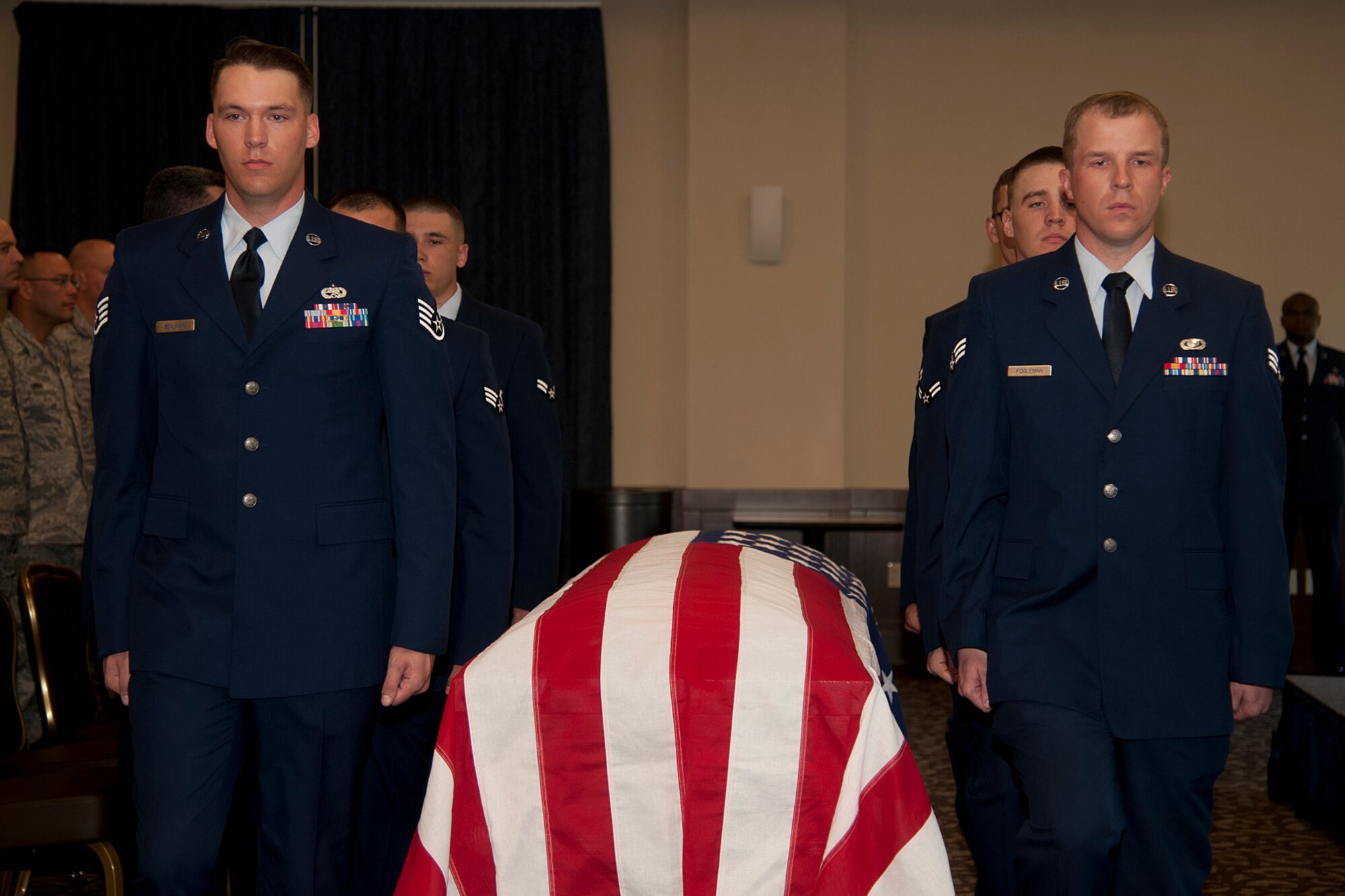 Six members of Fairchild’s Honor Guard perform a mock active duty funeral as part of the graduation ceremony Sept. 11, 2015, at Fairchild Air Force Base, Wash. The Airmen practice ceremony techniques for 12 days before performing for the public. (U.S. Air Force photo/Airman 1st Class Taylor Bourgeous)
