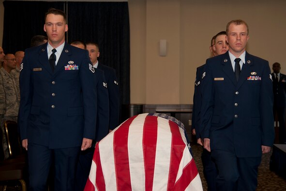 Six members of Fairchild’s Honor Guard perform a mock active duty funeral as part of the graduation ceremony Sept. 11, 2015, at Fairchild Air Force Base, Wash. The Airmen practice ceremony techniques for 12 days before performing for the public. (U.S. Air Force photo/Airman 1st Class Taylor Bourgeous)
