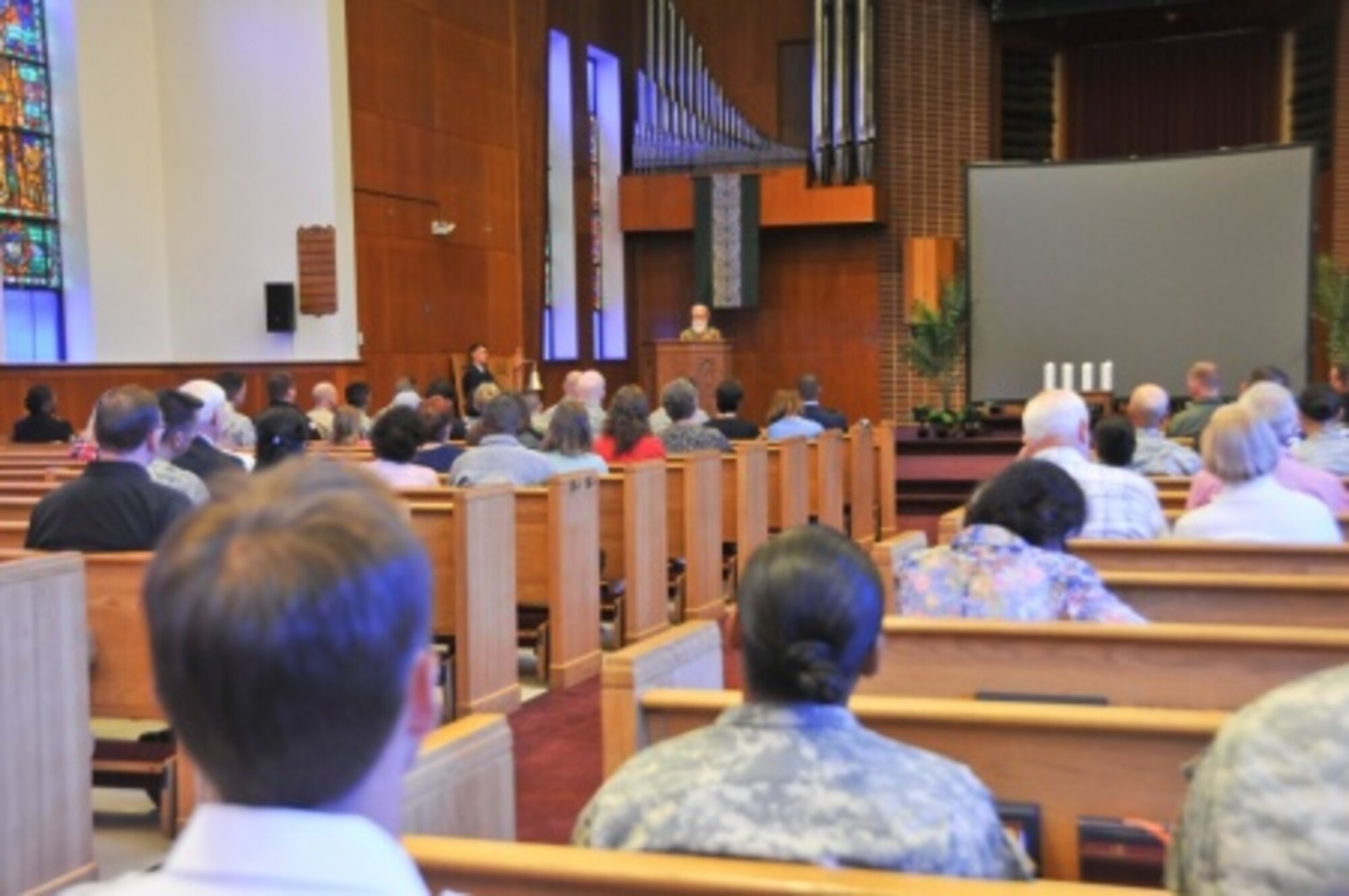 Retired Chap. (Col.) Jacob Z. Goldstein addresses dozens of service members, civilian employees, families, retirees, emergency responders and other community members at the 9/11 Remembrance Ceremony Sept. 11 at the Dix Chapel on Joint Base McGuire-Dix-Lakehurst, N.J. Goldstein spent five months coordinating relief efforts at Ground Zero in New York City following the Sept. 11, 2001, terrorist attacks. (U.S. Army photo by Sgt. Salvatore Ottaviano/Released)