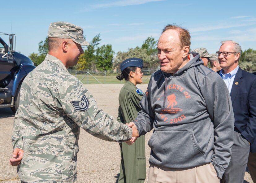 Dale Brown, former college basketball coach, is greeted by Airmen from the 91st Missile Wing at Minot Air Force Base, N.D., September 8, 2015. As a part of their base visit, Brown, Shaquille O’Neil, former professional basketball player, and Kevin Cramer, congressman, toured a B-52H Stratofortress, the Uniform 1 missile training facility, McAdoo Fitness Center, the base theater and Rockers Bar and Grill to meet with and speak to Minot personnel and families. (U.S. Air Force photo/ Airman 1st Class Justin T. Armstrong)