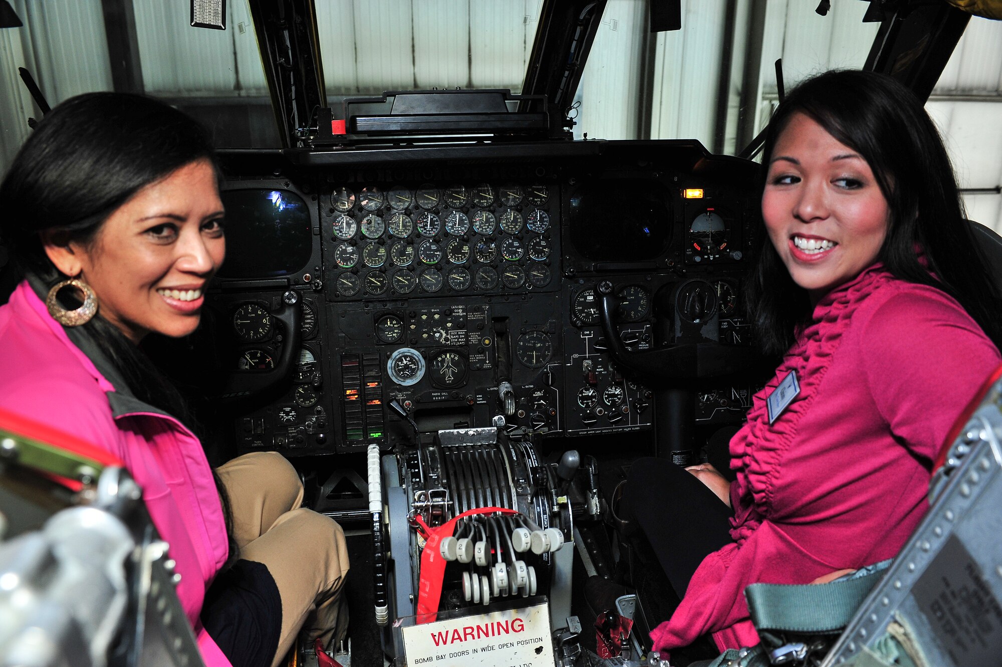 Team Minot spouses tour the cockpit of a B-52H Stratofortress at Minot Air Force Base, N.D., Sept. 9, 2015. In addition to viewing the cockpit, the spouse’s also learned about weapons carried by the aircraft, toured the weapon load training area and viewed flight simulations at the weapons system trainer.  (U.S. Air Force photo/Senior Airman Stephanie Morris)