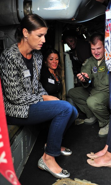 Team Minot spouses tour the cockpit of a B-52H Stratofortress at Minot Air Force Base, N.D., Sept. 9, 2015. In addition to viewing the cockpit, the spouse’s also learned about weapons carried by the aircraft, toured the weapon load training area and viewed flight simulations at the weapons system trainer.  (U.S. Air Force photo/Senior Airman Stephanie Morris)
