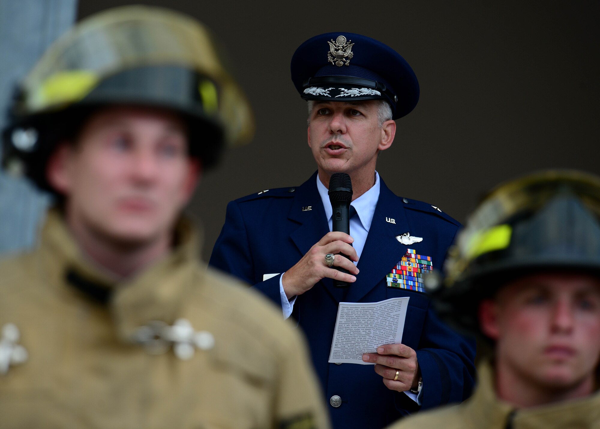 U.S. Air Force Brig. Gen. Barre Seguin, 31st Fighter Wing commander, speaks during a ceremony at the American-Italian Friendship Festival, on Sept. 12, 2015, in Spilimbergo, Italy. The festival allowed Team Aviano an opportunity to strengthen bonds with their host nation community. The event also included several demonstrations, food, sports tournaments, music and a ceremony. (U.S. Air Force photo by  Staff Sgt. Evelyn Chavez/Released)