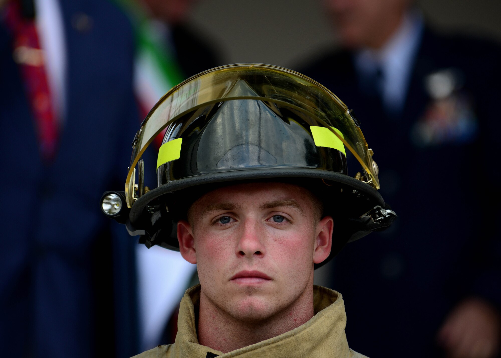 U.S. Air Force Airman 1st Class Grey Tedford, 31st Civil Engineer firefighter, listens during a ceremony at the American-Italian Friendship Festival, on Sept. 12, 2015, in Spilimbergo, Italy. The festival allowed Team Aviano an opportunity to strengthen bonds with their host nation community. The event also included several demonstrations, food, sports tournaments, music and a ceremony. (U.S. Air Force photo by  Staff Sgt. Evelyn Chavez/Released)