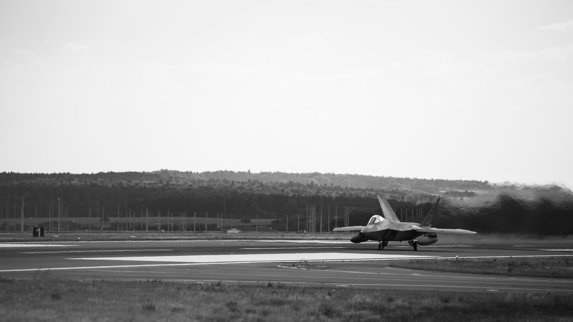 A U.S. Air Force F-22 Raptor fighter pilot assigned to the 95th Fighter Squadron at Tyndall Air Force Base, Fla., prepare for takeoff on the runway Sept. 11, 2015, at Spangdahlem Air Base, Germany. The F-22s conducted dissimilar air training with other fighter squadrons in U.S. Air Forces in Europe to include F-15 Eagle and F-16 Fighting Falcon fighter aircraft. The F-22 Raptors also forward deployed for short periods of time to non-U.S. NATO bases. The USAF’s forward presence in Europe allows training with U.S. allies and partners to develop and improve regional security. (U.S. Air Force photo by Staff Sgt. Christopher Ruano/Released)