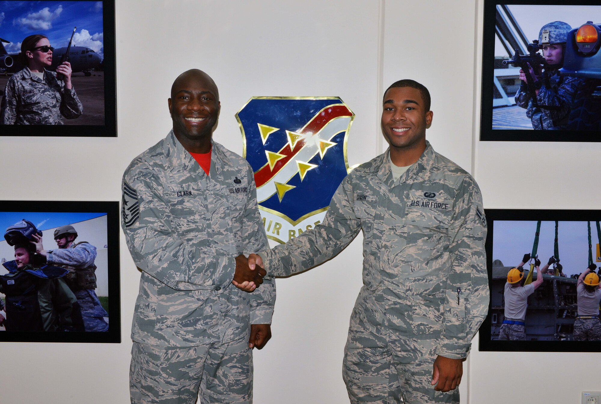Chief Master Sgt. Vegas Clark, 39th Air Base Wing commander, poses for a photo with Airman 1st Class Justin Dixon, 39th Comptroller Squadron customer service apprentice, upon meeting him for his chief shadow day Sept. 11, 2015, at Incirlik Air Base, Turkey. Airmen are chosen for chief shadowing based on recommendation from their leadership due to their dedication to the mission and their job. (U.S. Air Force photo by Senior Airman Michael Battles/Released)