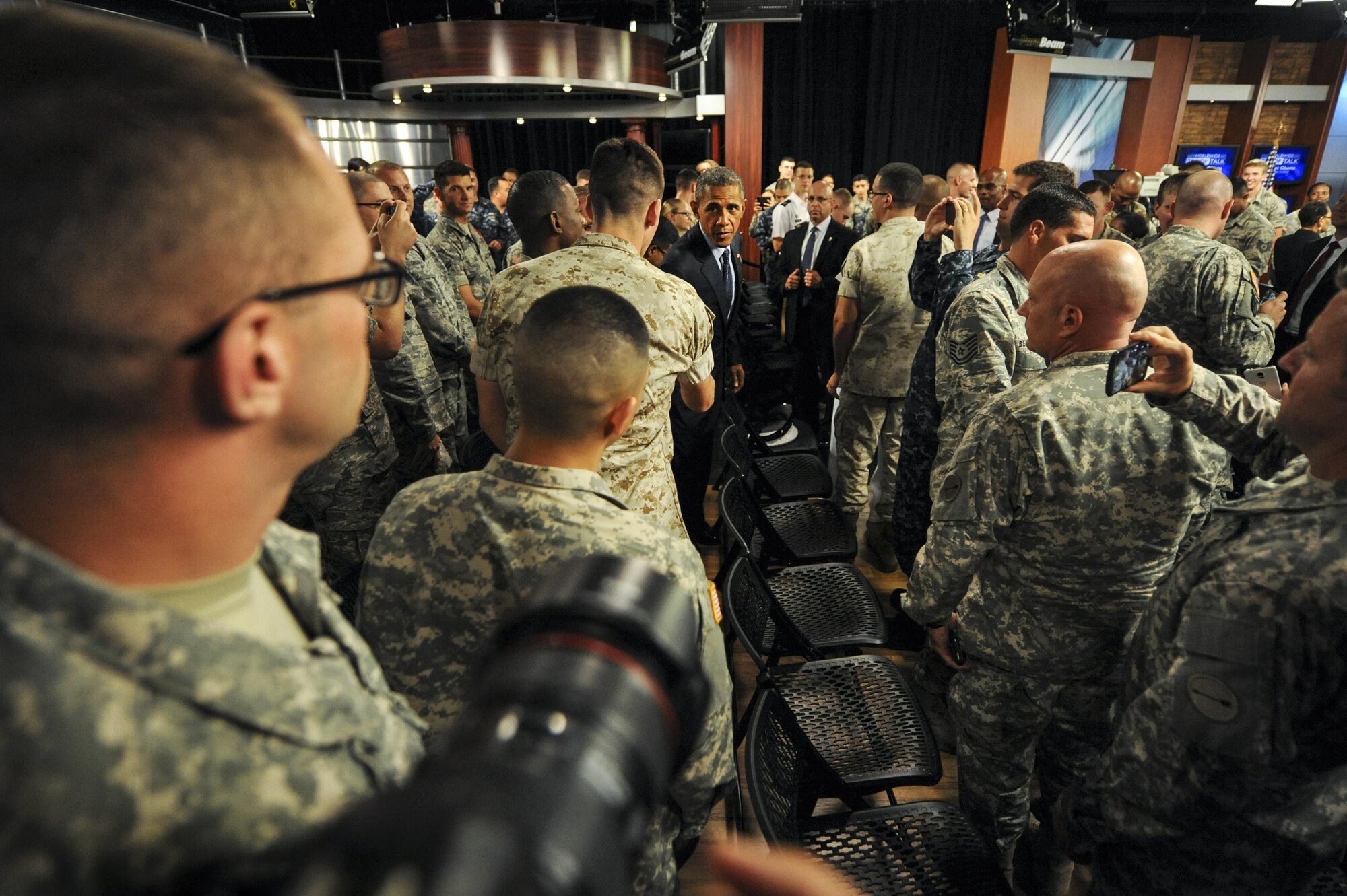 President Barack Obama greets service members before his worldwide troop talk from Fort Meade, Md., Sept. 11, 2015. Obama visited the base to conduct a live, televised troop talk with service members on the 14th anniversary of 9/11 from the Defense Media Activity studios. (Department of Defense photo /Marvin Lynchard)