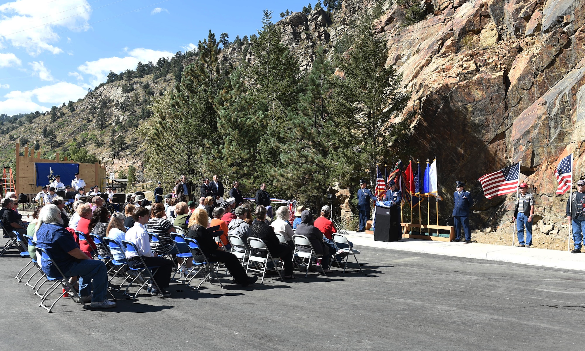 Col. John Wagner, 460th Space Wing commander, speaks to the audience during the I-70 Twin Tunnel re-naming ceremony Sept. 11, 2015, in Idaho Springs, Colo. Colorado State Legislature passed the bill in April 2015 to re-name the tunnels to recognize and remember the nation’s military veterans. (U.S. Air Force photo by Airman 1st Class Samantha Meadors/Released)