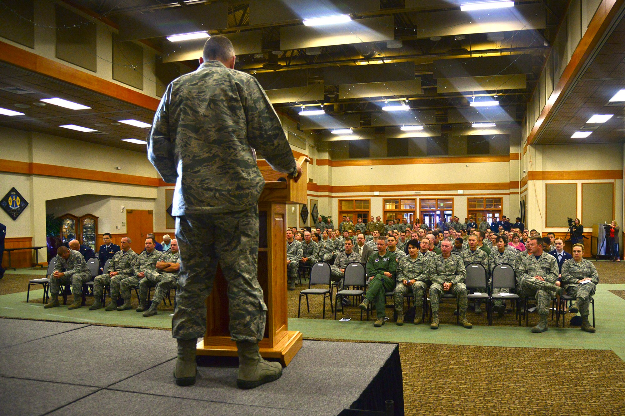 Col. Tom Wilcox, 341st Missile Wing commander, addresses the audience at the 9/11 Remembrance ceremony Sept. 11, 2015 at the Grizzly Bend at Malmstrom Air Force Base, Mont. Wilcox paid respect to the victims of the attack as well as to service members who paid the ultimate sacrifice to protect America. (U.S. Air Force photo/Airman Daniel Brosam)