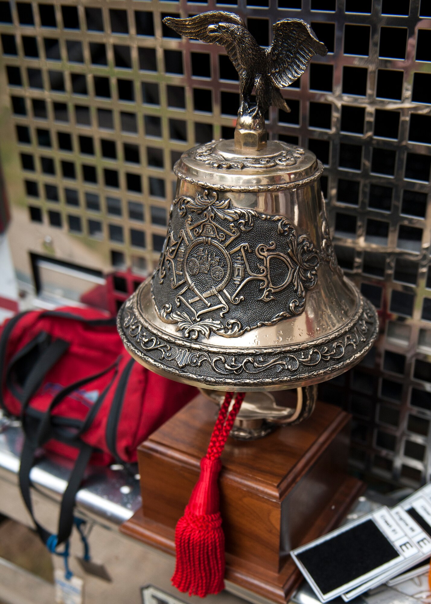 The 96th Civil Engineer Squadron’s fire department bell signifies tradition during the annual 9/11 memorial tower climb at Eglin Air Force Base, Fla. Sept. 11. Approximately 45 firefighters climbed 13 flights of steps with a name tag for each of the 343 firefighters who lost their lives 14 years ago. After reaching the top of the air traffic control tower, each name was recited and attached to a commemorative display board. The event closed with traditional bell rings and pauses between each ring to honor the 9/11 heroes. (U.S. Air Force photo/Ilka Cole)