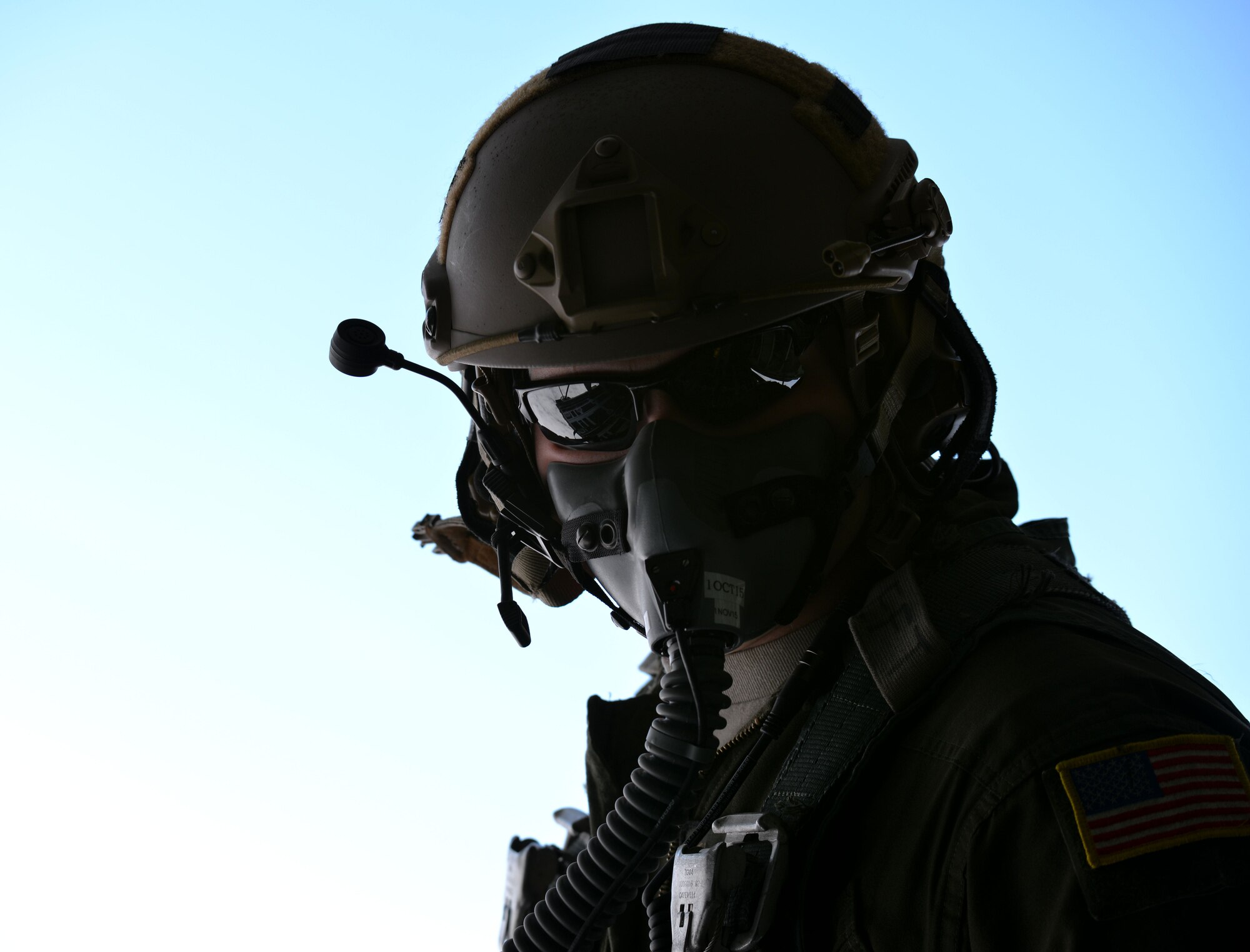 U.S. Air Force Senior Airman Jeremie Anderson, 67th Special Operations Squadron MC-130J loadmaster, scans the back of an MC-130J Commando II during a training mission Sept. 8, 2015, over the North Sea. The 67th SOS and the 48th FW organized the two-day mission in order to provide realistic targeting training for F-15 pilots. (U.S. Air Force photo by Tech. Sgt. Austin May/Released)