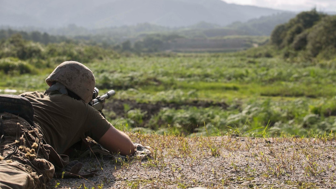 Lance Cpl. Kyle Frey fires his M40 Sniper Rifle at the 800-meter firing line during Forest Light 16-1 at Camp Imazu, Takashima, Japan, Sept. 11, 2015. The Marines fired at the 400, 600 and 800-meter firing line. The M40 is capable of precision firing from as far as 1,000 meters. Forest Light is a semiannual, bilateral exercise consisting of a command post exercise and multiple field training events, conducted by elements of III Marine Expeditionary Force and the JGSDF. Frey from Elverson, Pennsylvania, is a sniper with 1st Battalion, 2nd Marine Regiment, currently assigned to 4th Marine Regiment, 3rd marine Division, III Marine Expeditionary Force.