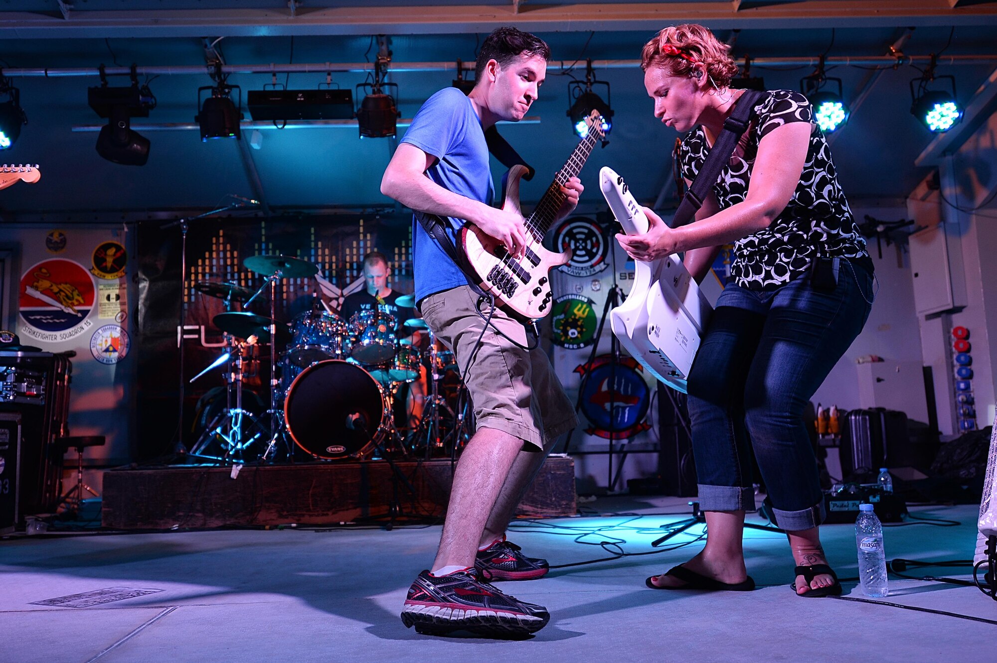 Staff Sgt. Jordan Kimbleand Staff Sgt. Michelle Hooper, Air Forces Central Command band members,
entertain military members during a performance at an undisclosed location in Southwest Asia, Aug. 27, 
2015. The AFCENT band is charged with keeping spirits high throughout the Central Command Area of Responsibility. (U.S. Air Force photo by Staff Sgt. Emerson Nuñez/Released)