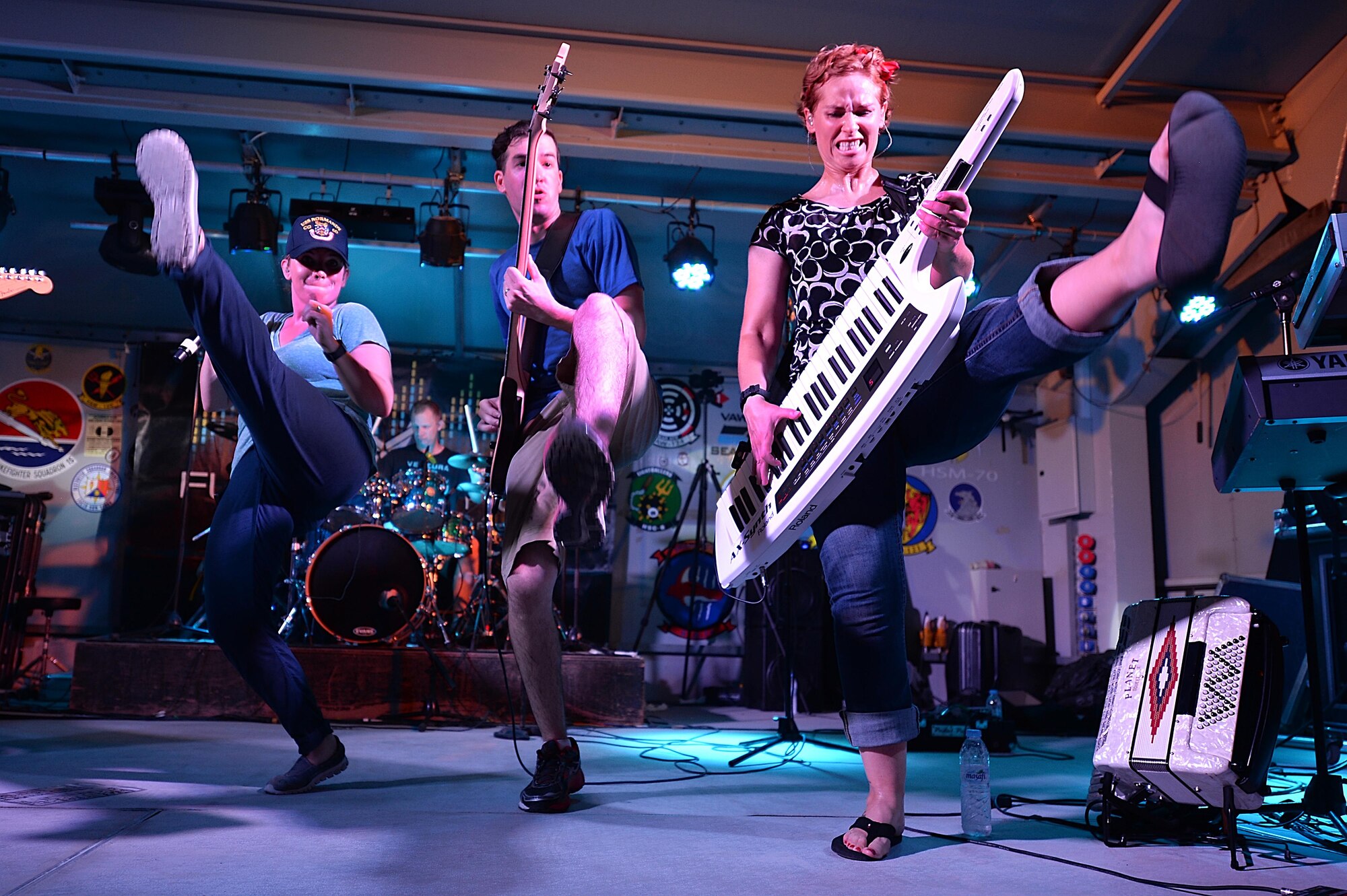 Members of the Air Forces Central Command band perform for service members at an undisclosed location in Southwest Asia, Aug. 27, 2015. With different priorities as a deployed band, the musicians work to reach as many Airmen as possible to keep spirits high everywhere they go.(U.S. Air Force photo by Staff Sgt. Emerson Nuñez/Released)
