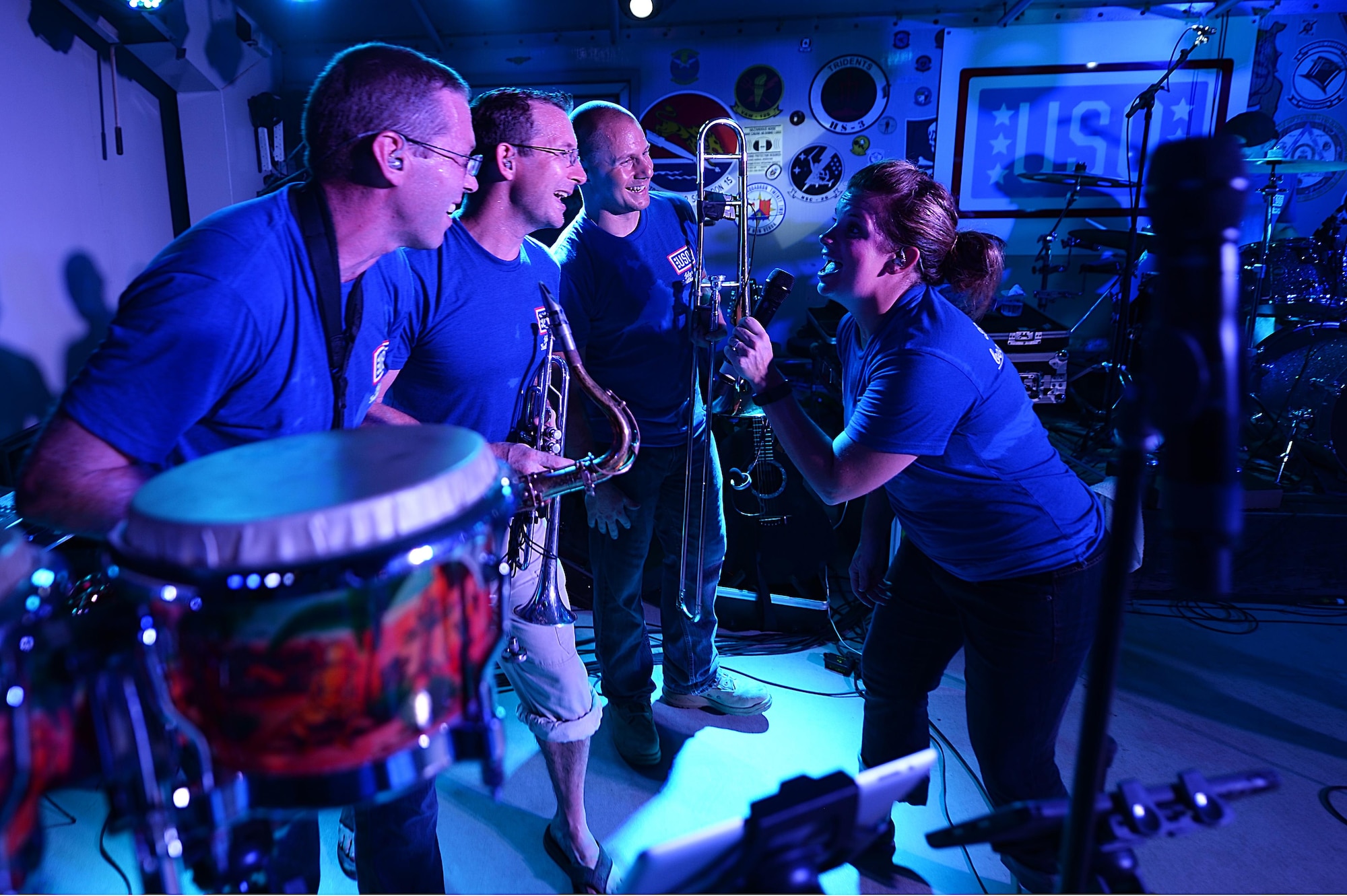 Air Forces Central Command band members entertain service members during a performance at an undisclosed location in Southwest Asia, Aug. 29, 2015. The AFCENT band is charged with keeping spirits high throughout the Central Command Area of Responsibility. (U.S. Air Force photo by Staff Sgt. Emerson Nuñez/Released)
