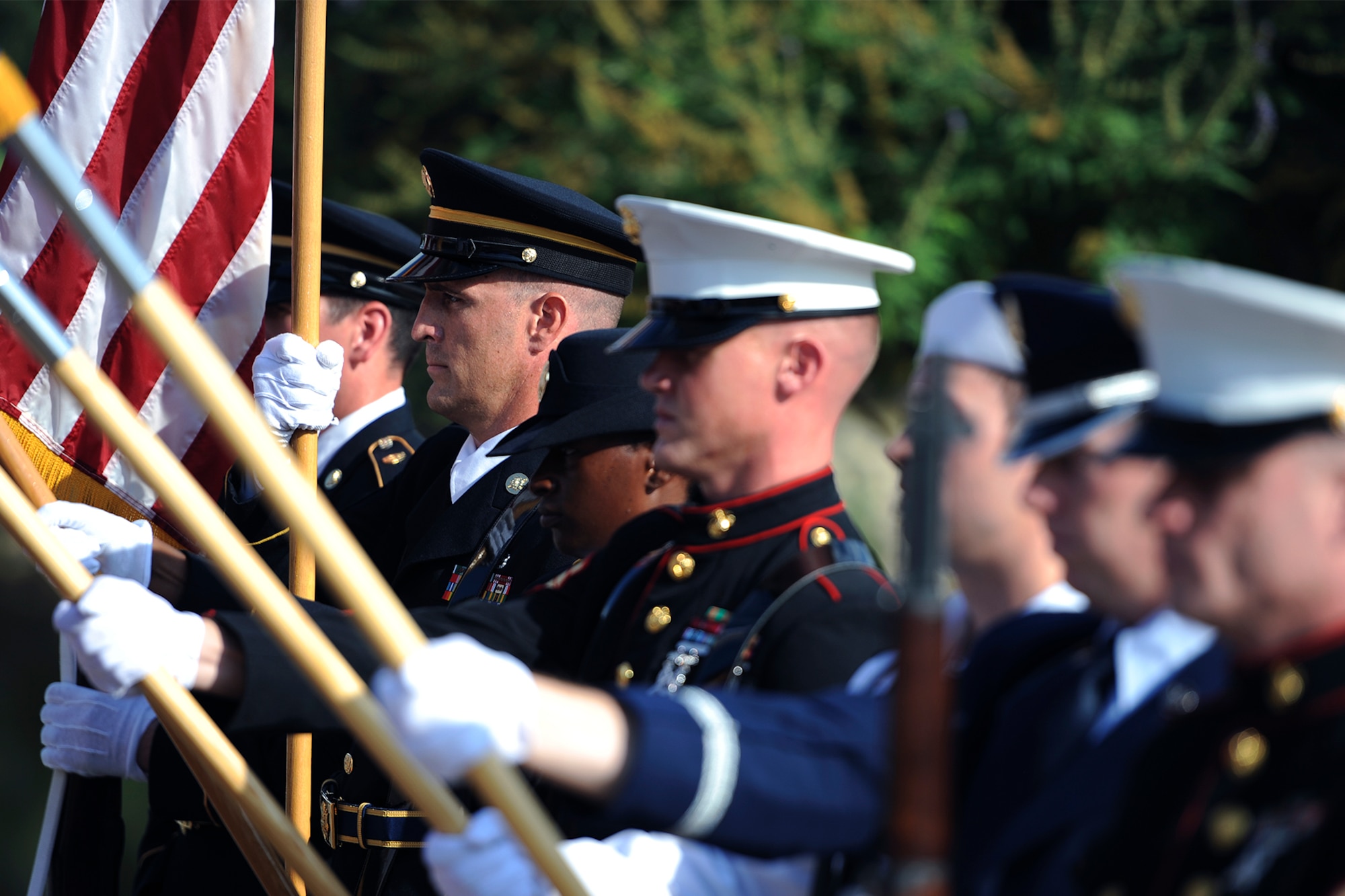 Goodfellow Air Force Base Joint Service Color Guard presents the nation’s flag during a 9/11 remembrance ceremony in San Angelo, Texas, Sept. 11, 2015. Community members gave speeches and prayer at the ceremony to honor the fallen from 9/11. (U.S. Air Force photo by Airman 1st Class Devin Boyer/Released)