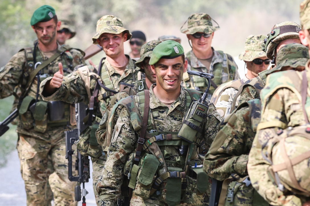 Croatian soldiers march back to base camp after completing  situational training during Immediate Response 15 in Slunj, Croatia, Sept. 15, 2015. Immediate Response 15 is a multinational, brigade-level, Command Post Exercise utilizing computer-assisted simulations and field training exercises in Croatia and Slovenia. U.S. Army photo by Sgt. 1st Class Caleb Barrieau