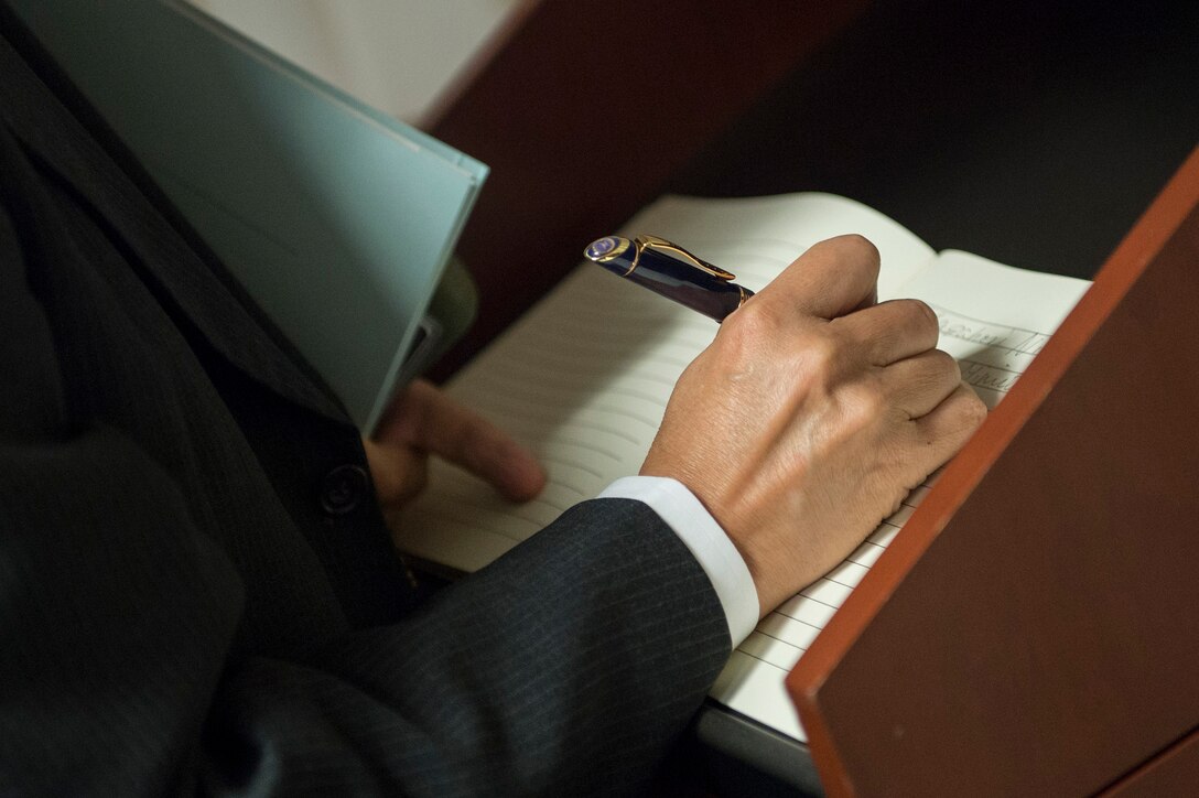 Japanese Vice Defense Minister Masanori Nishi signs a guest book as he arrives at the Pentagon to meet with Deputy Defense Secretary Bob Work, Sept. 15, 2015. Both leaders met to discuss matters of mutual importance. DoD photo by U.S. Air Force Senior Master Sgt. Adrian Cadiz