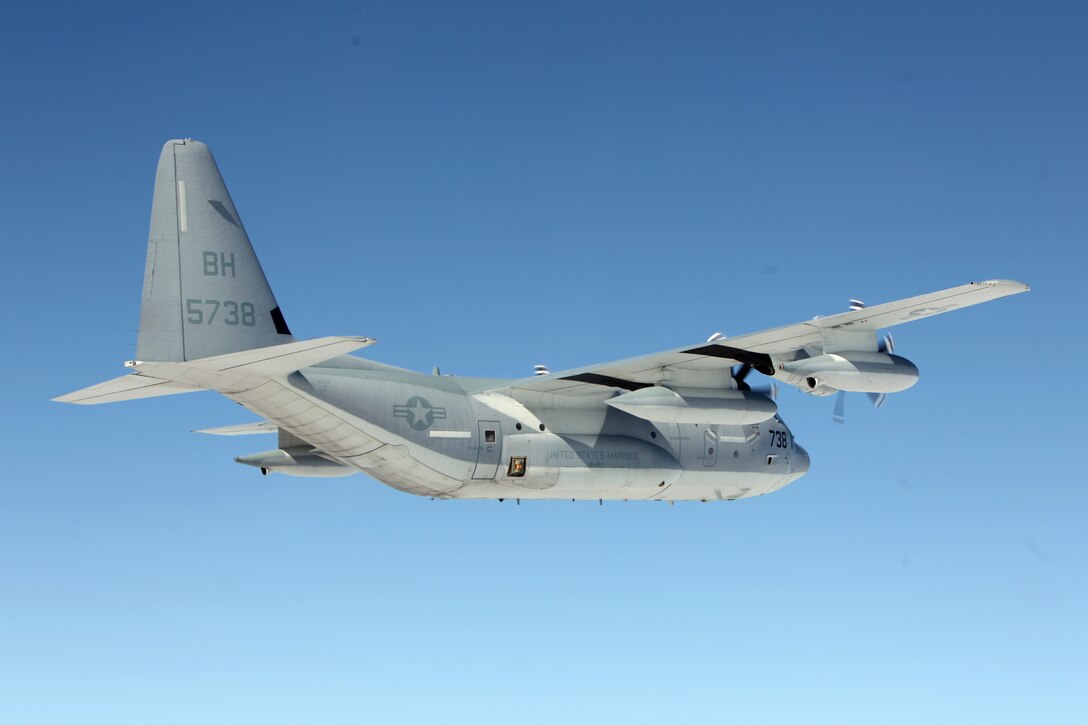 A KC-130J Super Hercules maneuvers through calm skies during a division flight over eastern North Carolina, Sept. 1, 2015. Marine Aerial Refueler Transport Squadron 252 provides the Marine Air-Ground Task Force commander with air-to-air refueling, assault support and offensive air support, day and night under all weather conditions during expeditionary, joint, or combined operations. The squadron has supported these operations since its activation June 1, 1928. VMGR-252 remains the oldest continually active squadron in the Marine Corps. (U.S. Marine Corps photo by Lance Cpl. Jason Jimenez/Released)