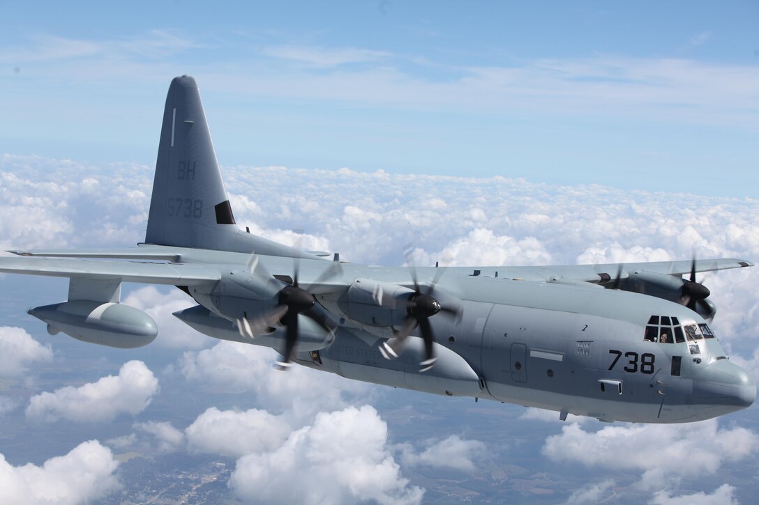 A KC-130J Super Hercules maneuvers through the skies during a division flight over eastern North Carolina, Sept. 1, 2015. Marine Aerial Refueler Transport Squadron 252 provides the Marine Air-Ground Task Force commander with air-to-air refueling, assault support and offensive air support, day and night under all weather conditions during expeditionary, joint, or combined operations. The squadron has supported these operations since its activation June 1, 1928. VMGR-252 remains the oldest continually active squadron in the Marine Corps. (U.S. Marine Corps photo by Lance Cpl. Jason Jimenez/Released)
