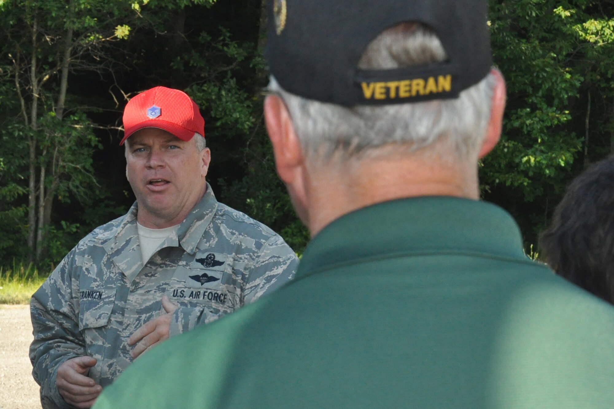 Air Force Reserve Master Sgt. Timothy Franken, an aerial delivery specialist assigned to the 76th Aerial Port Squadron, briefs a group of attendees during the 3rd Annual Joint Employer Awareness Event at the 910th Airlift Wing’s drop zone prior to a parachute-assisted air drop from a C-130 Hercules aircraft here, Aug. 6, 2015. The two-day event, designed to give civilian employers of Air Force Reservists and Ohio National Guardsmen a better understanding of the mission their employees carry out as members of the U.S. Armed Forces, also gave attendees the opportunity to get an up-close look at both the Ohio National Guard's Joint Military Training Center here and the 910th Airlift Wing's facilities at nearby Youngstown Air Reserve Station, Ohio. (U.S. Air Force photo/Master Sgt. Bob Barko Jr.)