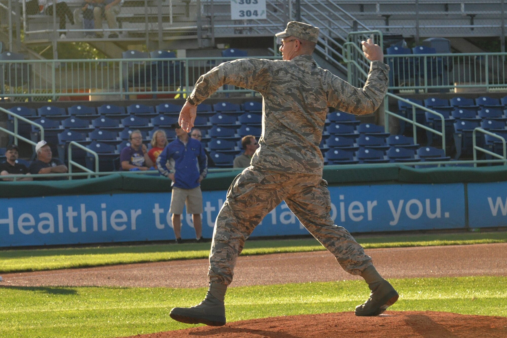 Col. Kevin Riley, 910th Mission Support Group Commander at nearby Youngstown Air Reserve Station, Ohio, throws a ceremonial first pitch during pre-game festivities for a Mahoning Valley Scrappers minor league baseball game at Eastwood Field here, August 12, 2015. A large group of the 910th Airlift Wing’s Citizen Airmen along with their families, friends and co-workers were in attendance and representatives from the 910th, also based at YARS, were involved in many game night activities for the annual YARS Night Out event where the Cleveland Indians Class A affiliate Scrappers edged the Hudson Valley Renegades, 2-0. (U.S. Air Force photo/Master Sgt. Bob Barko Jr.)