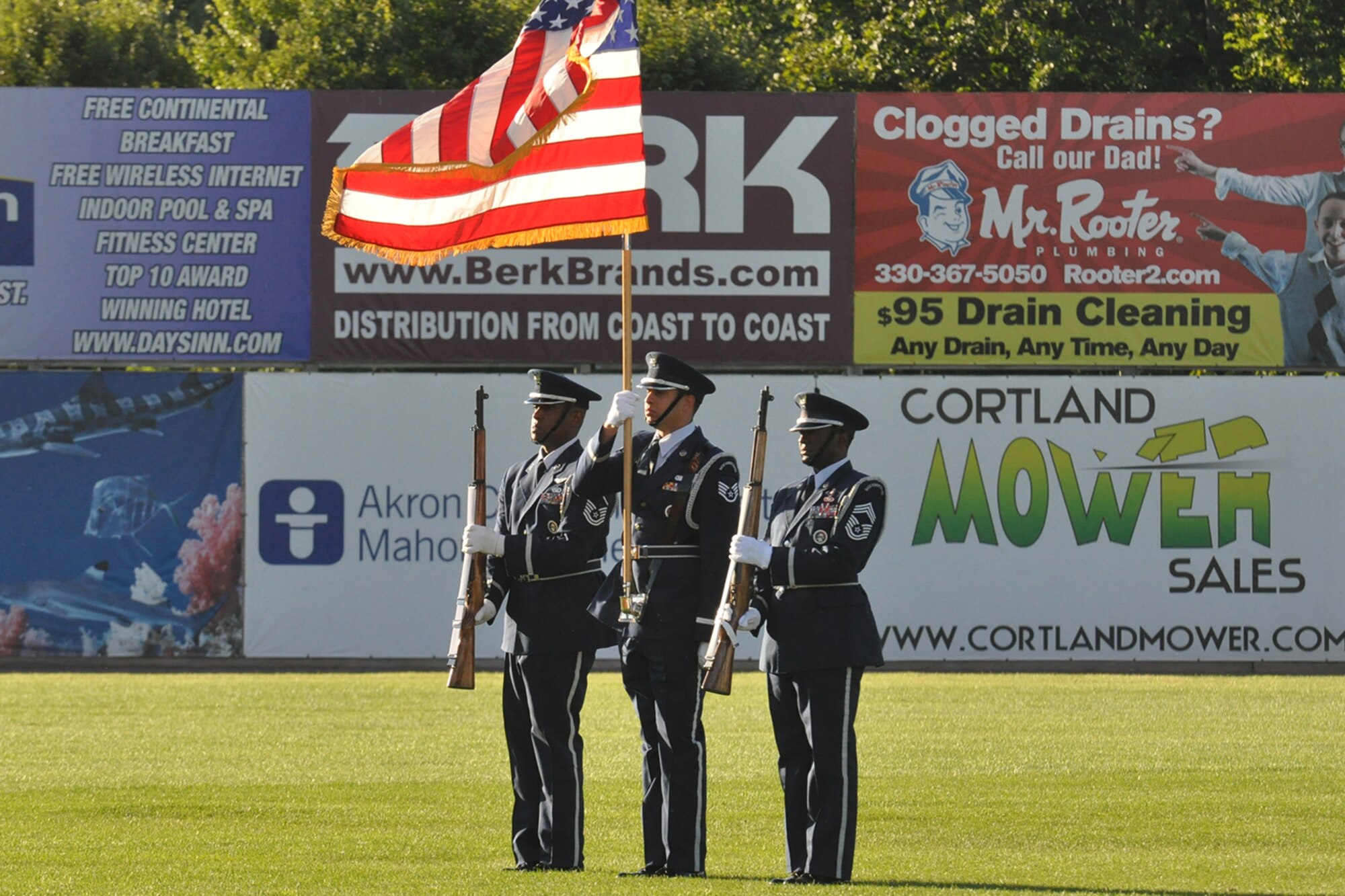 The Air Force Reserve’s 910th Airlift Wing Honor Guard presents the U.S. flag during pre-game festivities for a Mahoning Valley Scrappers minor league baseball game at Eastwood Field here, August 12, 2015. A large group of the 910th Airlift Wing’s Citizen Airmen along with their families, friends and co-workers were in attendance and representatives from the 910th, also based at YARS, were involved in many game night activities for the annual YARS Night Out event where the Cleveland Indians Class A affiliate Scrappers edged the Hudson Valley Renegades, 2-0. (U.S. Air Force photo/Master Sgt. Bob Barko Jr.)