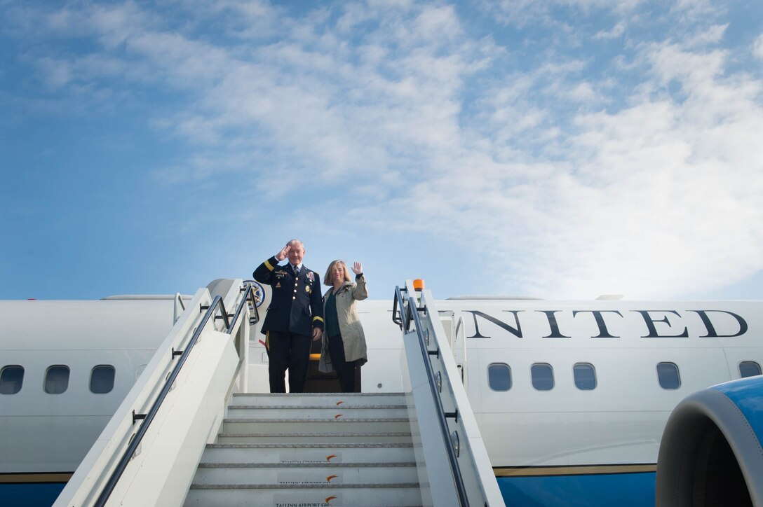 U.S. Army Gen. Martin E. Dempsey, chairman of the Joint Chiefs of Staff, and his wife, Deanie, gesture goodbye before leaving Estonia, Sept. 15, 2015. DoD photo by D. Myles Cullen